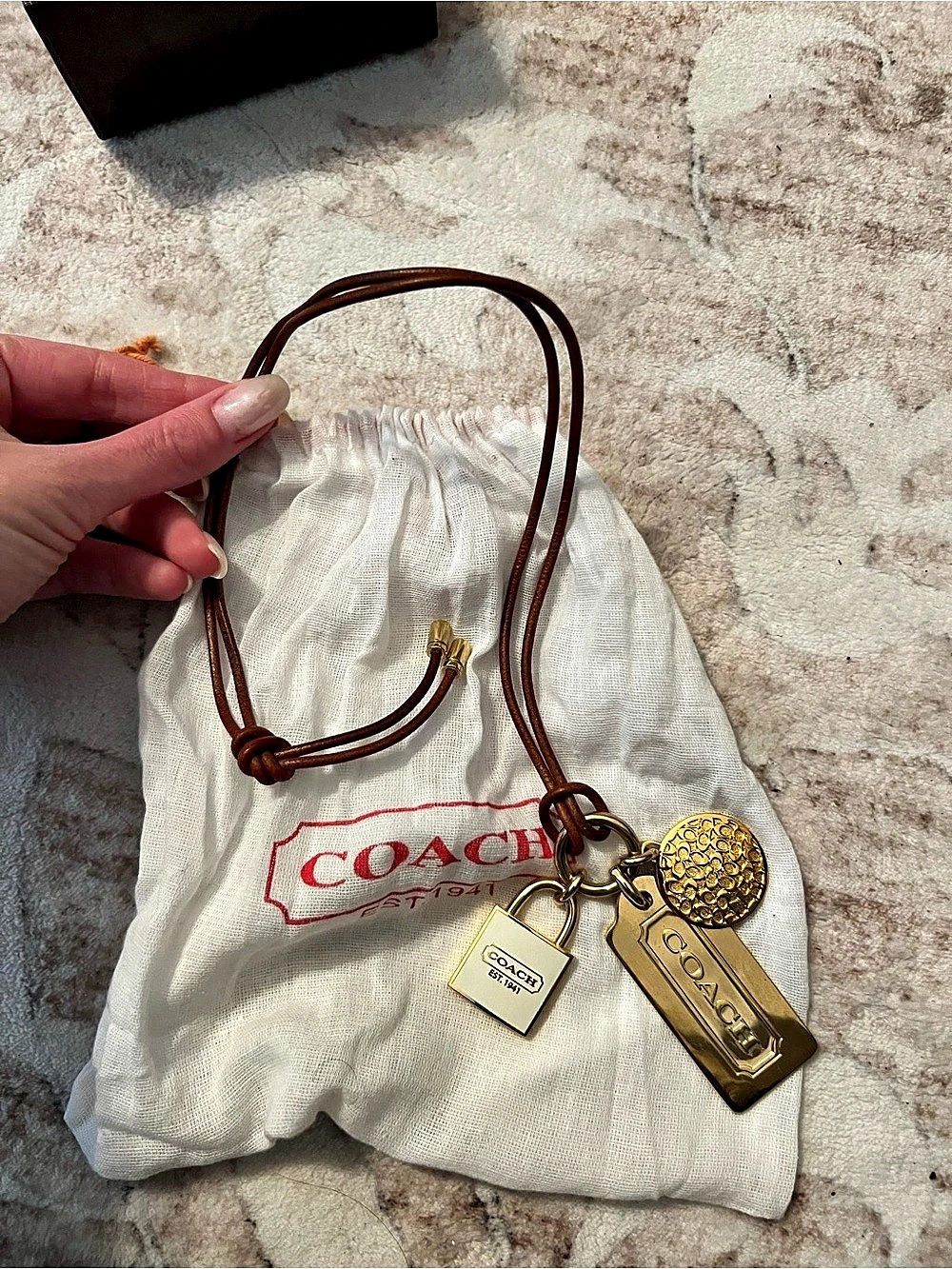 Coach Coin Multi Charm Pendant Necklace Gold-Tone Charm Necklace in Brown Like